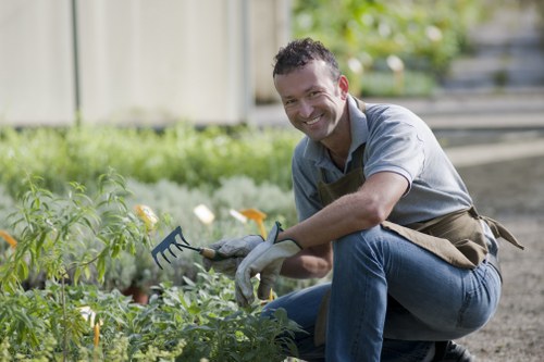 Gardener installing an efficient irrigation system